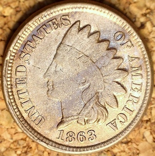 1863 Indian Head penny DDO-001 doubled die obverse showing doubling on LIBERTY headband and date numerals under magnification